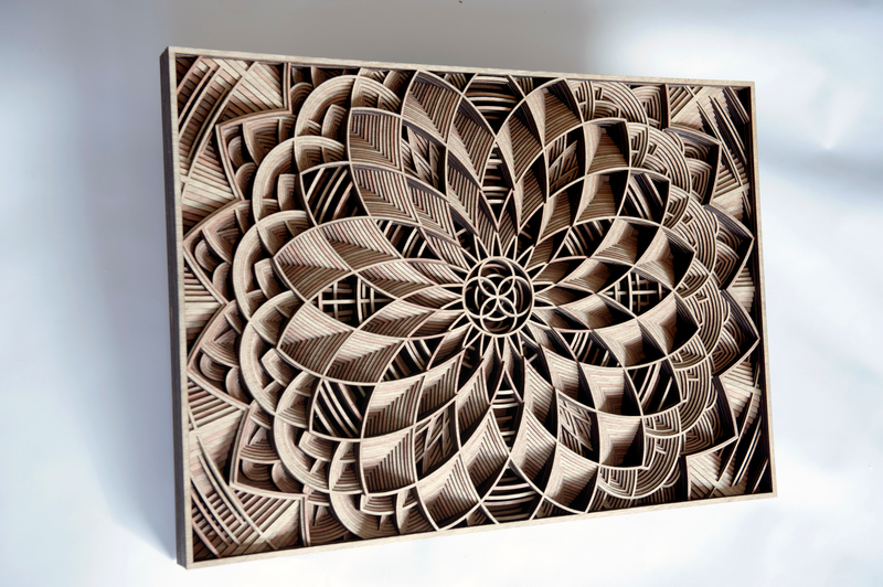 Illustration for article titled Artist Creates Stunning Wooden Sculptures With Laser Cutting Tech